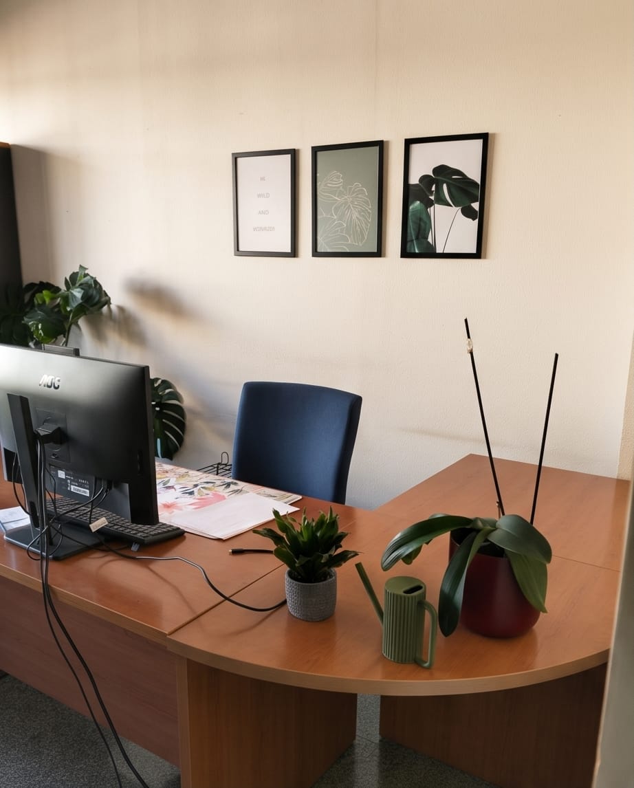 Green Teknospace watering can styled in a customer office