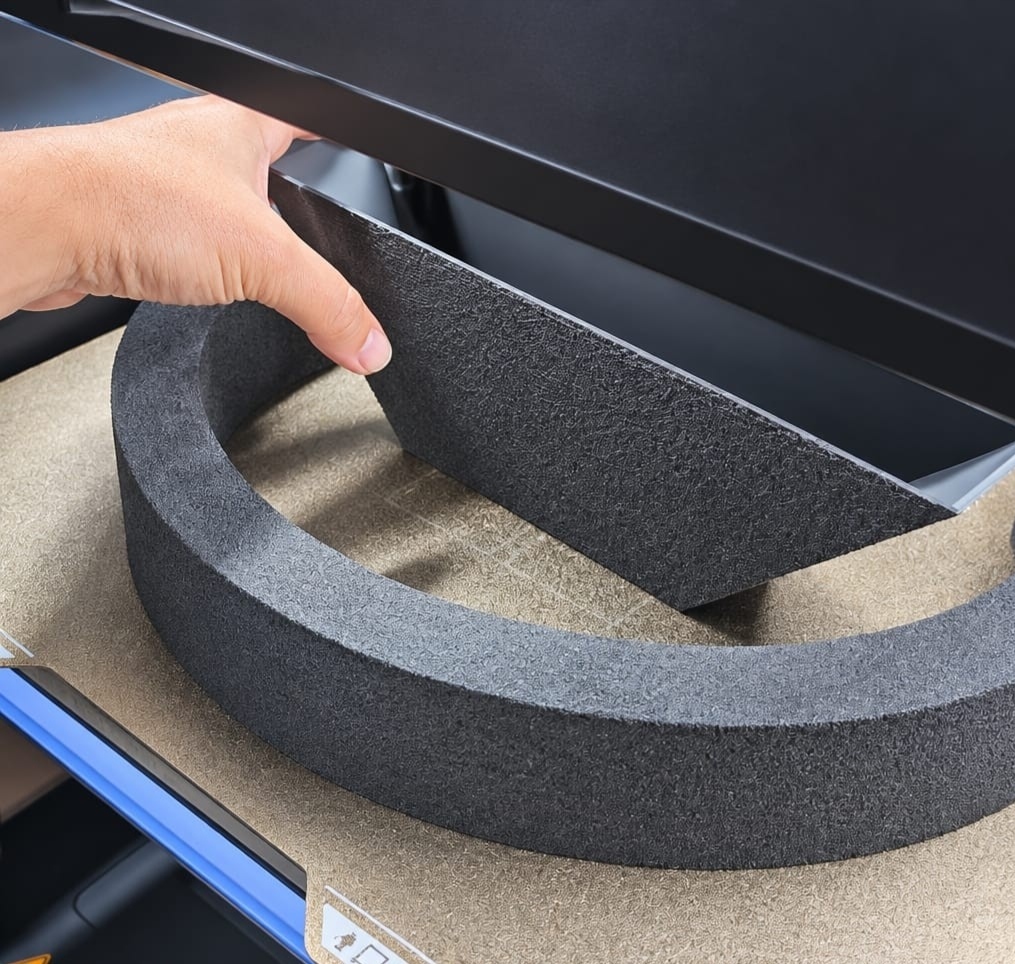 Hand removing a finished piece from the printer
